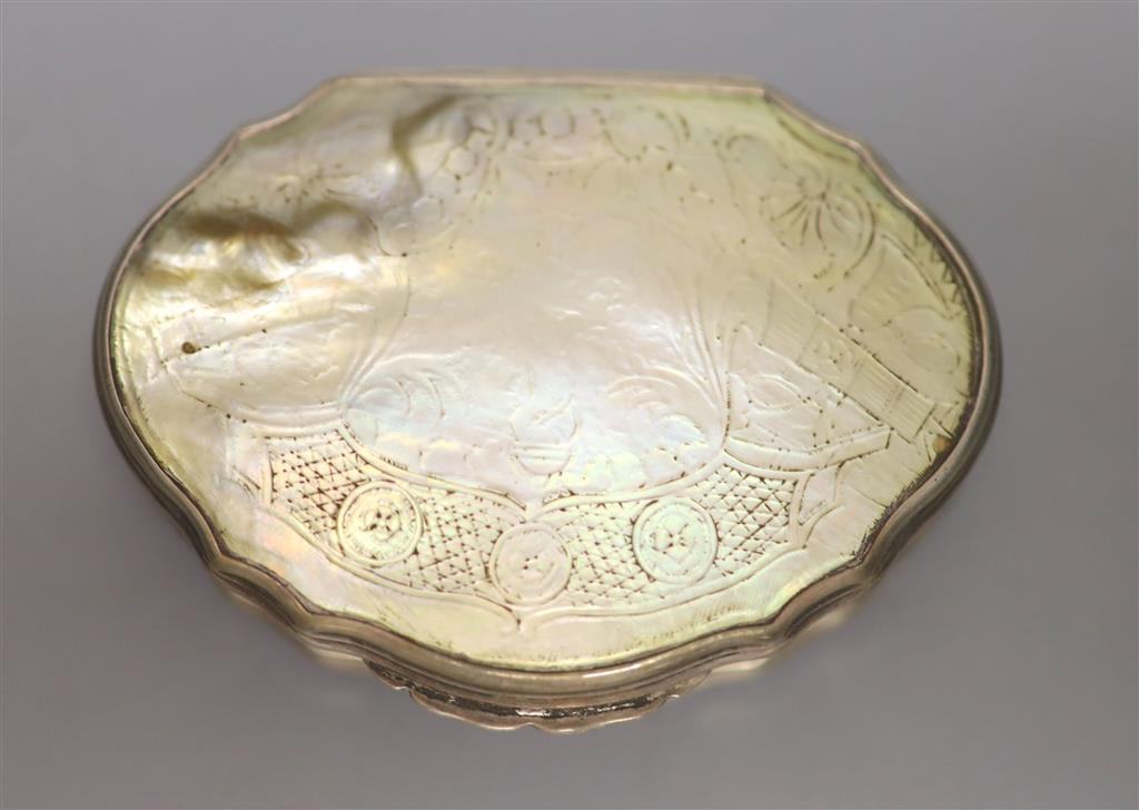 An early 19th century white metal and mother of pearl mounted cartouche shaped snuff box, 72mm, unmarked,